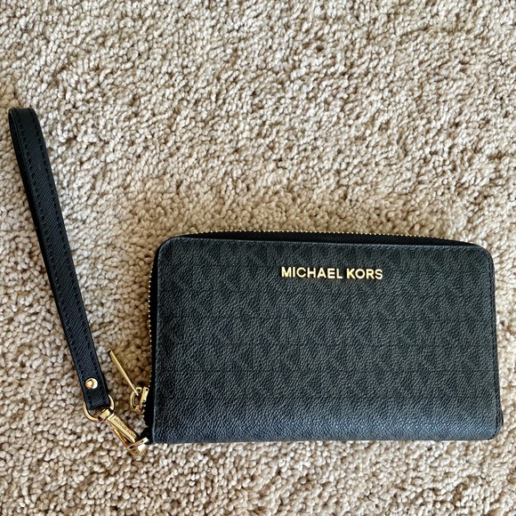 Michael Kors Handbags - Michael Kors Black Clutch *BRAND NEW*